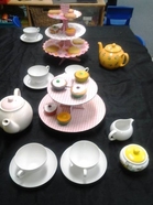 tea service and cakes set out for a tea party